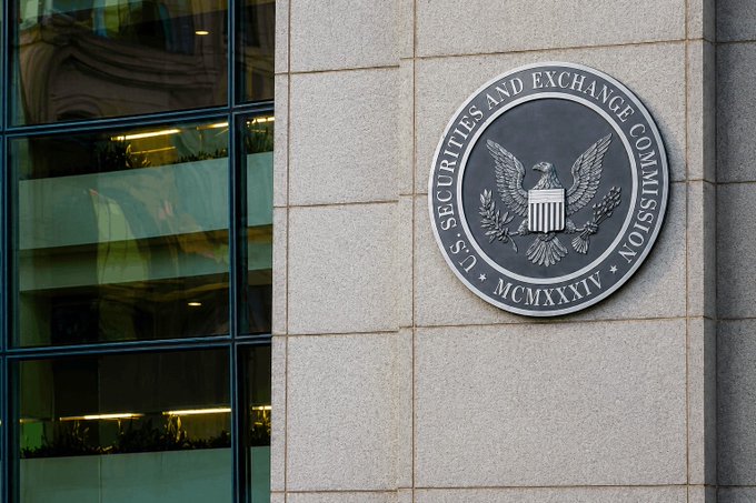 The image shows the U.S. Securities and Exchange Commission (SEC) seal mounted on a stone building exterior, displaying the agency's name and founding date (MCMXXXIV/1934). The seal directly relates to the post, as it represents the regulatory body whose "Innovation Exemption" Atkins is advancing to provide clarity for tokenized securities and liquidity providers.