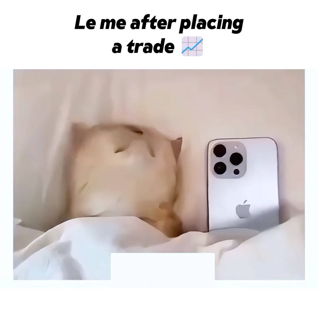 A humorous meme captioned 'Le me after placing a trade' showing a distorted, melting-looking face peeking out from under white bedsheets next to an iPhone.