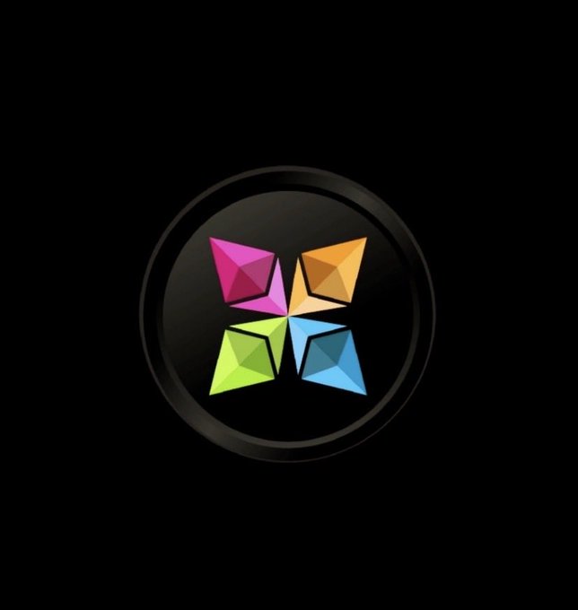A logo displays four colorful geometric pinwheel-like shapes (pink, orange, green, and blue) arranged in a cross pattern within a black circle.