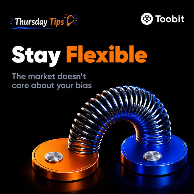 A dark-themed Toobit "Thursday Tips" graphic featuring the bold message "Stay Flexible - The market doesn't care about your bias," illustrated by a metallic spring stretched between an orange and blue base, visually symbolizing adaptability in trading. The Toobit logo appears in the top right corner alongside a lightbulb icon next to the "Thursday Tips" header.