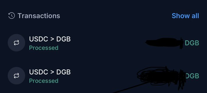 A 'Transactions' screen on a dark background showing two 'USDC > DGB' processed transactions, with one amount partially redacted in black and the other fully scribbled out.