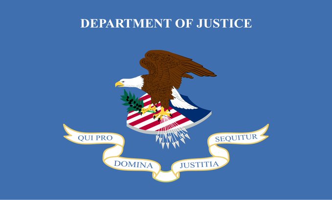 The flag of the U.S. Department of Justice, featuring its eagle emblem and Latin motto "QUI PRO DOMINA JUSTITIA SEQUITUR," is displayed against a blue background, symbolizing the federal prosecution of Edward Zimbardi in his $165 million crypto Ponzi scheme case.