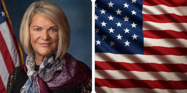 A professional headshot of a woman with shoulder-length gray hair, wearing a black lace top and a purple patterned scarf, is displayed alongside a large American flag. The image accompanies a statement from Sen. Cynthia Lummis emphasizing the critical decision Congress faces regarding the future of U.S. financial innovation versus allowing China to lead.