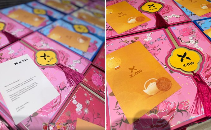 Two photographs of decorative pink boxes with tassels labeled 'X·me,' featuring golden inserts with imagery of moon cakes and traditional Chinese lanterns.