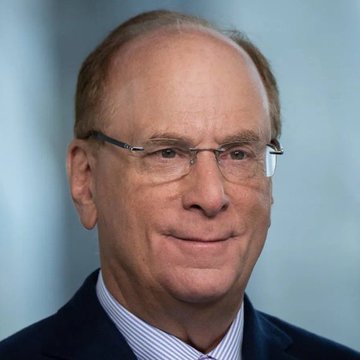 A professional headshot of an older man with glasses, balding gray hair, and a friendly smile, wearing a striped shirt and dark blazer against a soft blue background—likely a portrait of a BlackRock executive related to the firm's record $407 million cryptocurrency ETF purchases across Bitcoin and Ethereum.