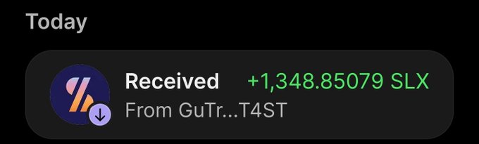 A dark-mode app notification showing a 'Received' transaction of '+1,348.85079 SLX' 'From GuTr...T4ST'.