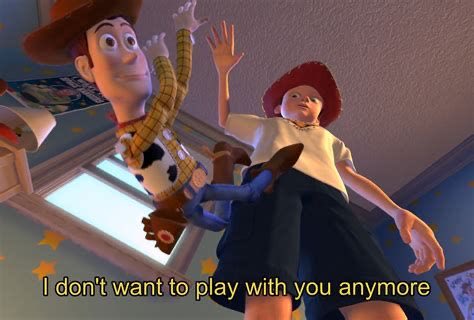A scene from Toy Story showing Woody being held up by Sid, with the caption 'I don't want to play with you anymore'.
