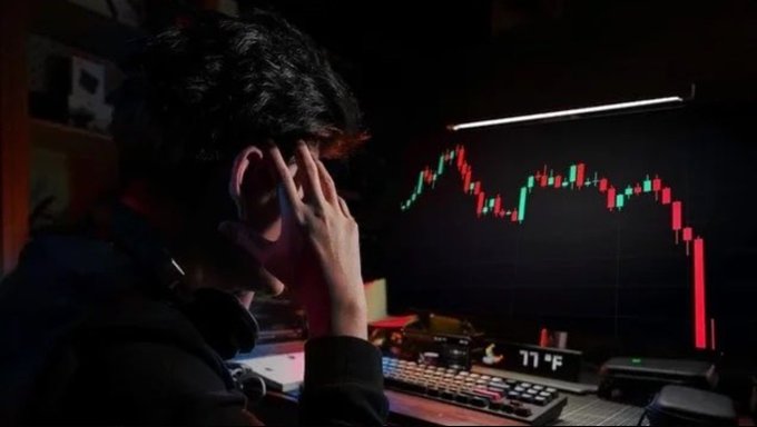A trader clutches his head in distress as a computer monitor displays a sharp red candlestick chart showing a steep market decline, visually reinforcing the post's message of a "$270 MILLION LIQUIDATED IN 24H" bloodbath that rekt over 101,292 traders across $BTC, $ETH, $SOL, and $BNB.