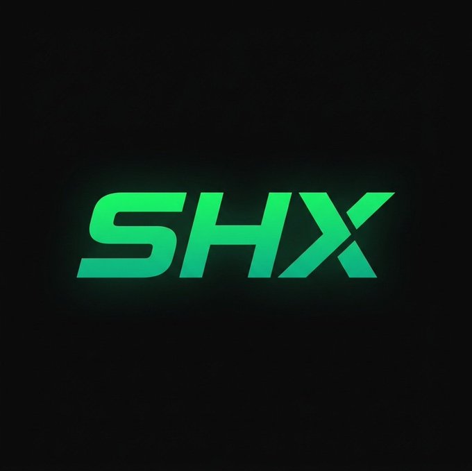 A bold green "SHX" ticker logo displayed against a black background, representing the Solana utility token that powers the SHX Exchange ecosystem. The image serves as branding for the token, complementing the post's introduction of Shulevitz ($SHX) and its role in decentralized trading infrastructure.