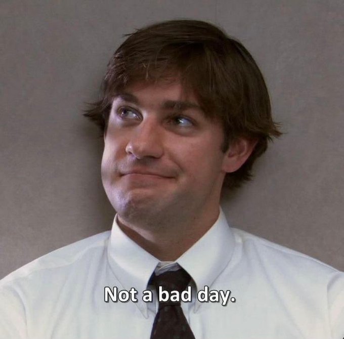 A close-up of Jim from The Office looking smug with the caption 'Not a bad day.'