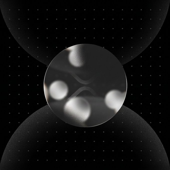 A dark, mysterious promotional image featuring a translucent sphere with blurred spherical shapes inside, set against a black background with curved shadowy forms and faint dotted patterns. The abstract, shadowy aesthetic hints at an undisclosed product reveal, aligning with the cryptic teaser announcing the "biggest drop yet" launching Monday.