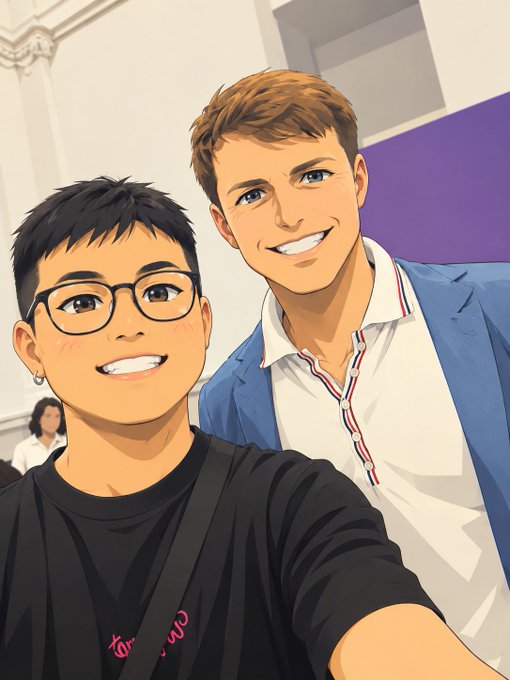 An anime-style illustration of two young men taking a selfie, one with dark hair and glasses in a black shirt, and another with reddish-brown hair in a white shirt and blue blazer.