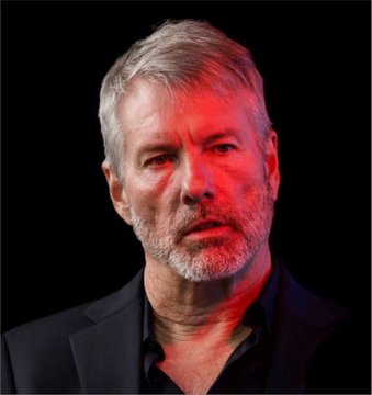 A portrait of a gray-haired man with a serious expression, illuminated by red lighting against a black background.