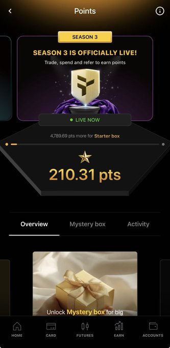 A mobile app screen displays 'SEASON 3 IS OFFICIALLY LIVE!' with a balance of '210.31 pts' and navigation tabs for Home, Card, Futures, Earn, and Accounts.