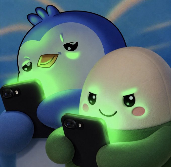 Two plush toys, a blue bird-like character and a white round character, looking at smartphones that cast a green glow on their faces.