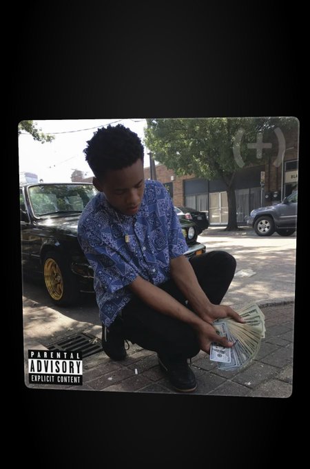 An album cover with a 'PARENTAL ADVISORY EXPLICIT CONTENT' label depicts a young man in a blue patterned shirt squatting on a sidewalk while holding stacks of cash.