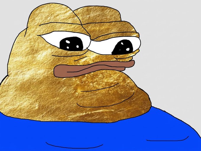 A cartoon-style golden, textured head resembling Homer Simpson with large eyes and a neutral expression, wearing a blue shirt.