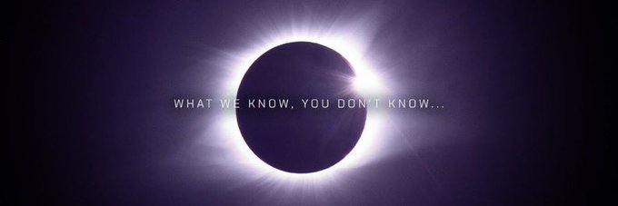 A total solar eclipse with the moon silhouetted against the sun's glowing corona displays the text "WHAT WE KNOW, YOU DON'T KNOW..."—a cryptic teaser that mirrors the post's theme of mystery and unknown potential surrounding $MCV and @themoonclave.