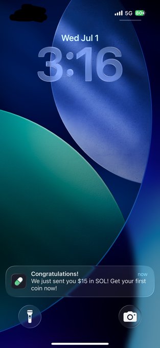 A smartphone lock screen displays the time "3:16" on "Wed Jul 1" with a notification reading, "Congratulations! We just sent you $15 in SOL! Get your first coin now," directly illustrating the free Solana airdrop mentioned in the post.
