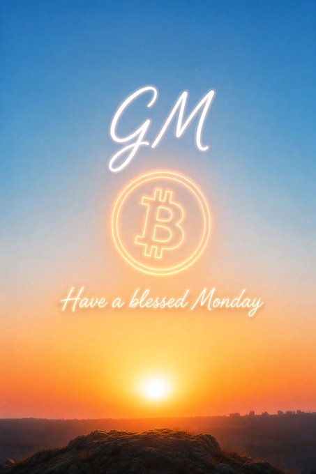 A vertical image showing a sunset over a mountainous horizon with neon-style text reading "GM," a Bitcoin symbol inside a glowing circle, and "Have a blessed Monday" at the bottom.