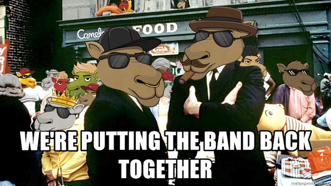 A 'Blues Brothers' style meme featuring two cartoon animal characters in black suits, hats, and sunglasses standing in a crowd, overlaid with the text 'WE'RE PUTTING THE BAND BACK TOGETHER'.