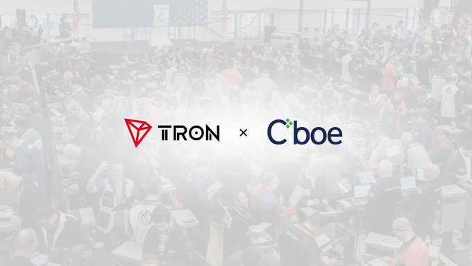 Logo graphic featuring TRON and Cboe with an 'x' between them, displayed over a faded background image of a busy trading floor with many traders.