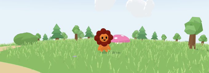 A low-poly 3D animated scene shows a cartoon lion with an orange body and brown mane standing in a grassy field surrounded by stylized trees and a pink mushroom under a blue sky.