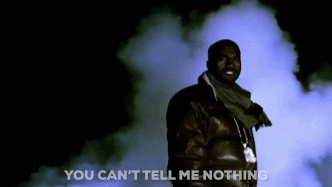 The image features a man wearing a brown leather jacket, standing against a black background with smoke coming out from behind him. The caption of the image reads "You Can't Tell Me Nothing". This phrase seems to be related to Bitcoin or cryptocurrency news, as indicated by the reference to MSTR (Market Trading Service) and its market cap. The man's attire suggests that he might be involved in the crypto world or simply interested in it.