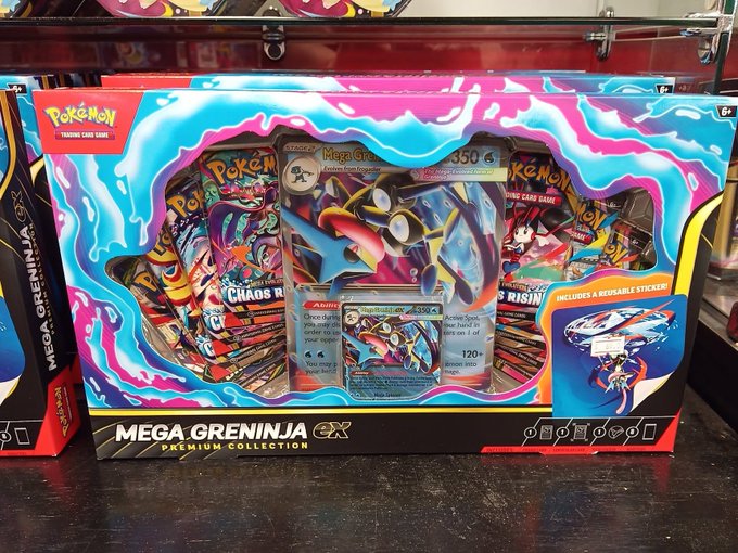 A Mega Greninja ex Premium Collection box sits on a store shelf, prominently displaying its $59.99 price tag alongside the Pokémon Trading Card Game logo and details like "350 HP" and a "reusable sticker" feature. The image supports the post's sentiment about market inflation, as what was once an affordable hobby has become prohibitively expensive for longtime collectors.