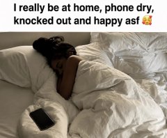 A meme-style image of a person lying face-down in bed under white blankets, with text above reading, “I really be at home, phone dry, knocked out and happy asf.”