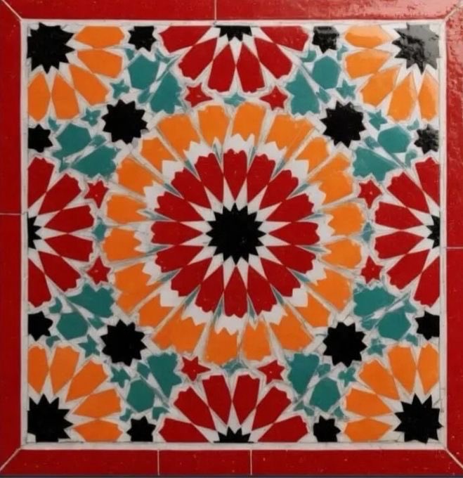 The image features a colorful mosaic tile design with red, green, yellow, blue, orange, black, white, and gray colors arranged in an intricate pattern. The tiles are set against a red border that adds contrast to the vibrant colors of the design. The image is accompanied by a caption that reads "Zelij Origins Giveaway 888 supply coming on ETH I'm giving away ... Follow @srhsnn & @ZelijOrigins → Like + comment Picking winners in 24 hours, good luck!".