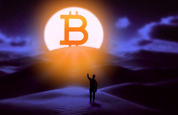 A silhouette of a person reaches up toward a large glowing Bitcoin logo set against a glowing sunset and desert dunes.