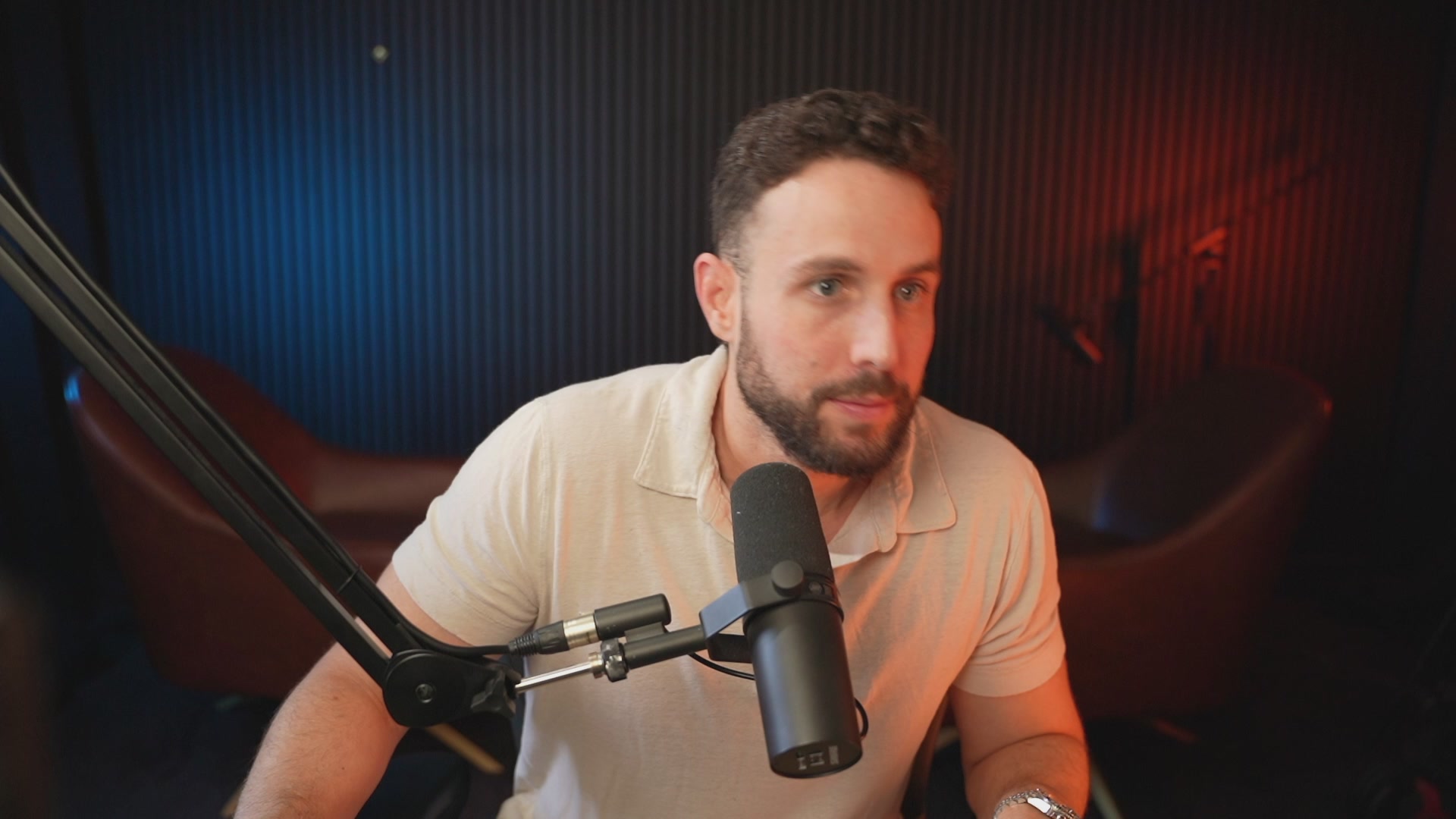 The image features a man sitting at a desk wearing a white shirt and holding an audio microphone. The caption on the image reads, "This month will be absolutely HISTORIC for markets Big banks claim the Tradfi TOP IS IN as we approach the SpaceX $SPCX IPO Meanwhile $BTC holds over $60K, is the bear market over? LIVE NOW with the best trader in the world". 

The man's positioning at a desk suggests that he might be participating in an online event or conference related to the SpaceX and Bitcoin markets. The caption implies that something significant is happening in these markets that makes it worth discussing. As the market situation described is quite unusual, people might want to watch the live stream of events as well.