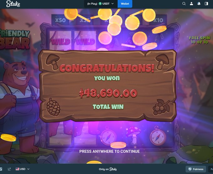 A screenshot from Stake.com showing a slot game win notification of $48,690.00 on a "Friendly Bear" game, matching the post's boast of hitting for $48,000+ on the first spin.