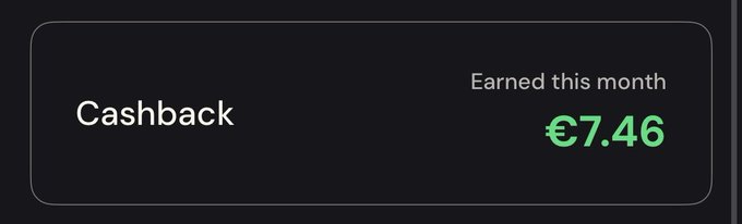 A dark interface card displays the text 'Cashback' and 'Earned this month' with the amount '€7.46' shown in green.