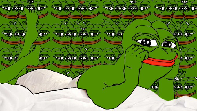 iliad, a cartoon frog with red eyes and a big smile, lies on its back with arms raised, surrounded by a sea of green frogs.