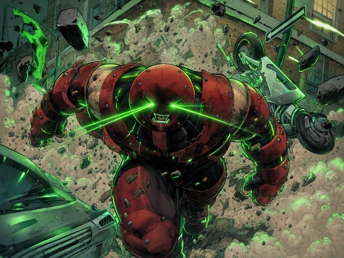 A massive, battle-damaged armored figure in crimson plating charges through an urban street, glowing green energy crackling from its eyes and machinery as it crushes vehicles amid flying debris and dust. The image visually embodies the unstoppable, destructive force of "JUGGERNAUT," mirroring the post's framing of the token as a powerful yet underutilized asset within the Robinhood ecosystem, weighed down by migration issues.