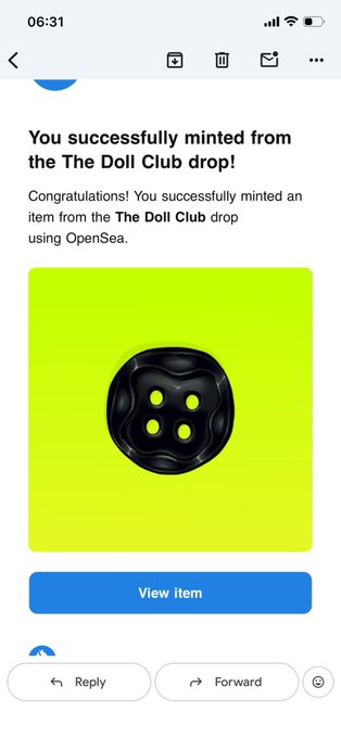 A mobile screenshot of an email notification reading "You successfully minted from the The Doll Club drop! Congratulations! You successfully minted an item from the The Doll Club drop using OpenSea," displaying a black four-holed button graphic.