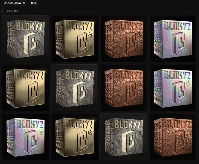 Grid display of 12 3D-rendered cubes labeled 'BLOKYZ', featuring various textures including marble, gold, copper, and a pearlescent finish.