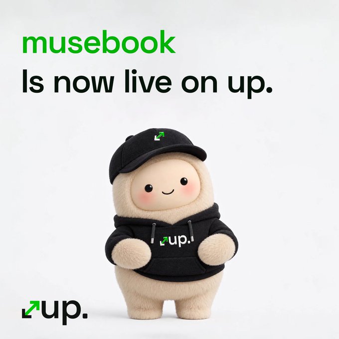 A cute mascot wearing a black hoodie and cap, both featuring the "up." logo, stands against a white background beneath the headline "musebook is now live on up." The "up." branding appears in the bottom left corner, reinforcing the announcement of musebook's launch on the Robinhood Chain platform.