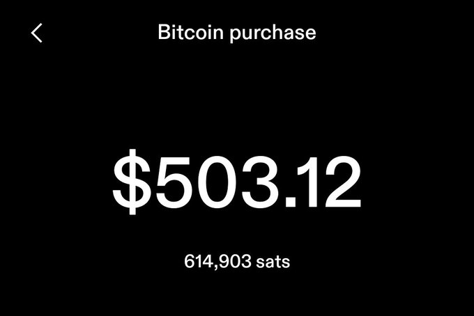 A dark-themed Bitcoin purchase confirmation screen displaying a transaction amount of $503.12, equivalent to 614,903 sats.