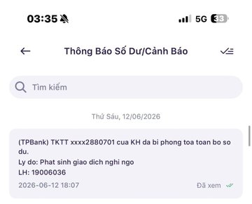 A screenshot of a Vietnamese banking notification from TPBank (account ending in 2880701) dated 12/06/2026 at 18:07, showing an alert that the account has been temporarily locked due to suspected fraud. The image illustrates the bank account freeze issue described in the post, where a seller had their bank account locked after a Binance transaction.