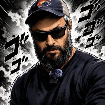 A stylized, dramatic portrait features a bearded man wearing sunglasses and a black cap, with Japanese katakana characters 'ゴゴゴ' floating dramatically around his head.