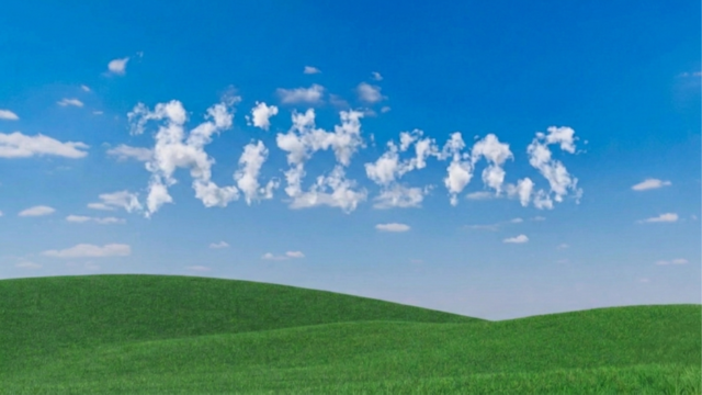 The image features a large green field with rolling hills under a clear blue sky dotted with white clouds. The text "Happy to announce my collaboration with @abskittens We giveaway 1 X 20$ in Sol 5 X Waitlist Spots GIVEAWAY! - Follow @abskittens - Like, comment & RT" is written on the image. This post seems to be promoting a contest or giveaway related to the content of the image.