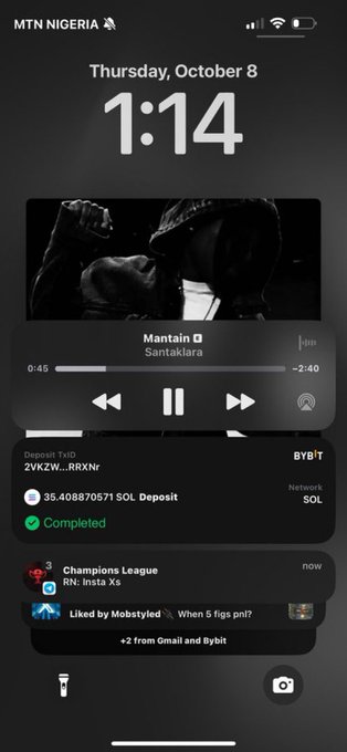 A smartphone lock screen displaying Thursday, October 8 at 1:14, showing music playing with a Santakara track, a crypto deposit notification showing 35.408870571 SOL Deposit Completed, and Champions League notification, with MTN NIGERIA carrier visible.