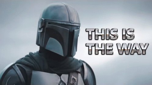 The image features a man wearing a silver helmet with a futuristic design, standing against a gray background. Below him, there's text that reads "This is the way". The caption also includes an additional piece of information about Bitcoin, stating that CardoneCapital adds another 130 BTC on pullback.