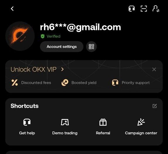 A mobile app screenshot showing a user profile for 'rh6***@gmail.com' (Verified) on what appears to be the OKX platform, featuring an 'Unlock OKX VIP' banner with 'Discounted fees', 'Boosted yield', and 'Priority support', along with shortcuts like 'Get help' and 'Demo trading'.