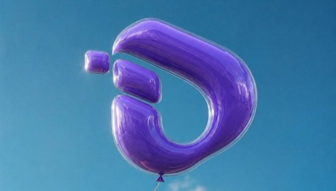 This image shows a purple balloon shaped like the "D" logo of Interlink floating in a blue sky. The image visually represents the idea of Interlink "lifting off" or "progressing" as mentioned in the accompanying text.