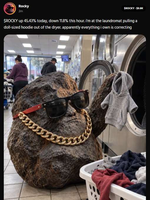 Humorous social media post from 'Rocky' showing a rock wearing sunglasses and a gold chain holding a tiny gray hoodie at a laundromat, with text joking about 'ROCKY' being up 45.43%.