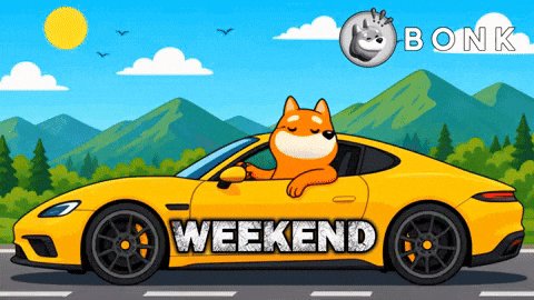 The image features a cartoon dog sitting inside a yellow sports car, with mountains visible in the background. Below the car, there's text that reads "Weekend", indicating that the weekend has officially begun. The overall scene suggests a fun and lighthearted atmosphere, possibly related to a gaming event or promotional campaign for GM MoonPay Weekend.